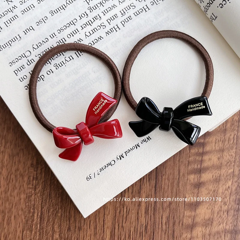 Exquisite bow tie headband ~ K - Table Tennis France recension och pris